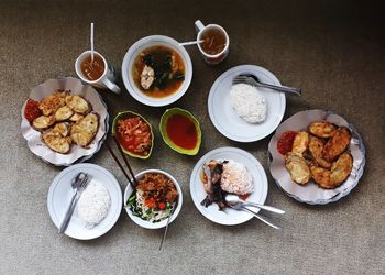 Directly above shot of food served on table