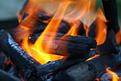 Close-up of fire on wood