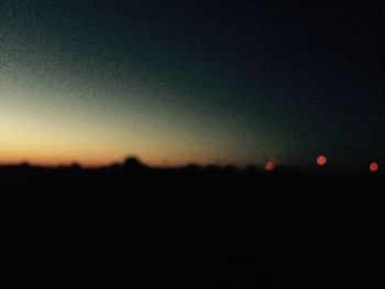 Scenic view of landscape at sunset