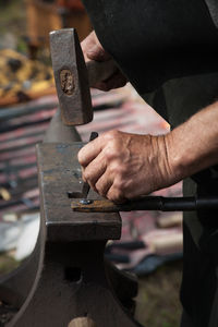 Close-up of person working