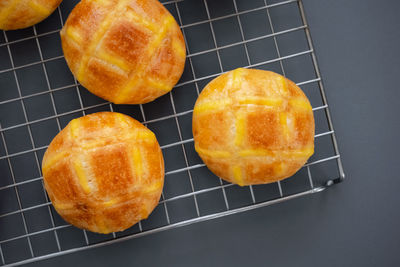 High angle view of orange slices on barbecue grill