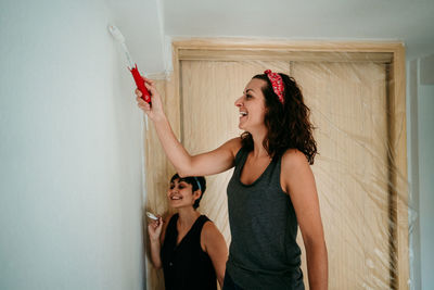 High angle view of women painting at home