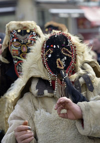 Close-up of man wearing mask at carnival