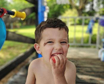 Portrait of cute boy holding ice cream