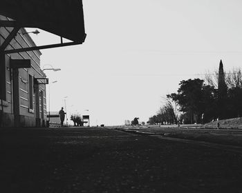 View of road along buildings