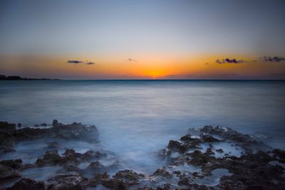 Scenic view of sea during sunset