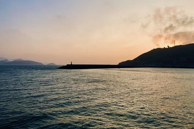 Scenic view of sea against sky during sunset