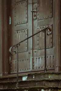 Closed door of old abandoned building