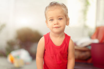 Portrait of cute girl standing outdoors