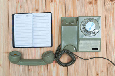 High angle view of telephone on table