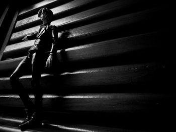 High angle view of woman on staircase