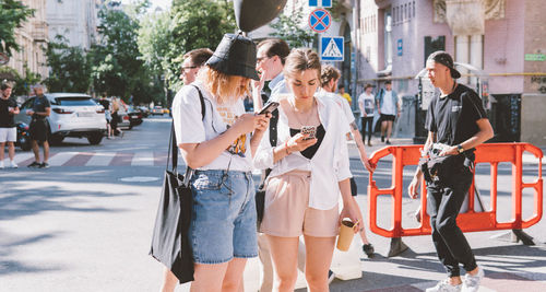 People walking on city street