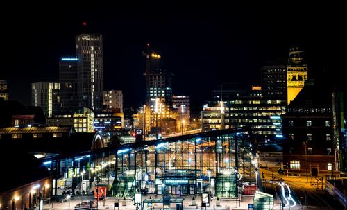 Illuminated cityscape at night