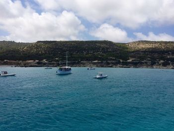 Boats sailing in sea