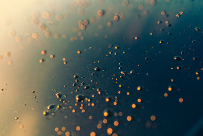 Full frame shot of raindrops on glass