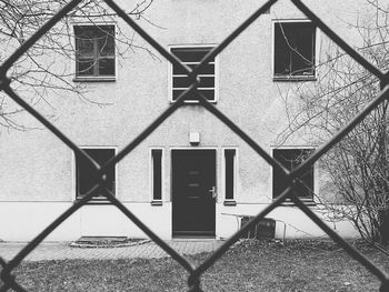 Building seen through chainlink fence