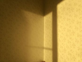 Close-up of sunlight falling on wall