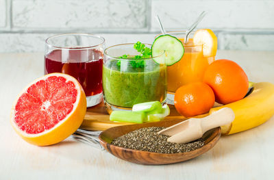 Fruits in glass on table