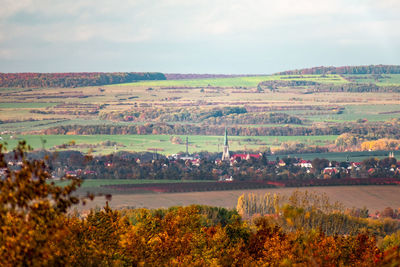 Scenic view of landscape against sky during autumn