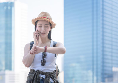 Young woman using mobile phone