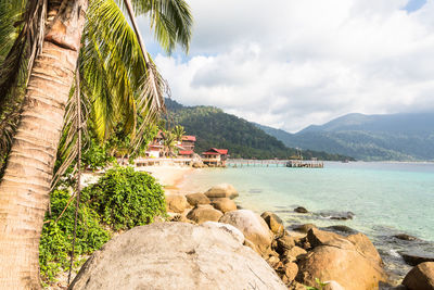 Scenic view of sea against cloudy sky