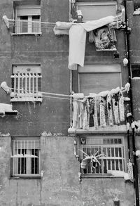 Low angle view of clothes hanging on building