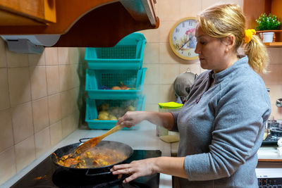 High angle view of man preparing food