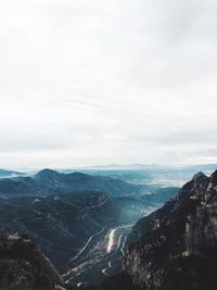 Aerial view of landscape against cloudy sky