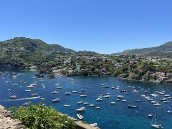 Scenic view of sea against clear blue sky