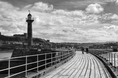 View of bridge against cloudy sky