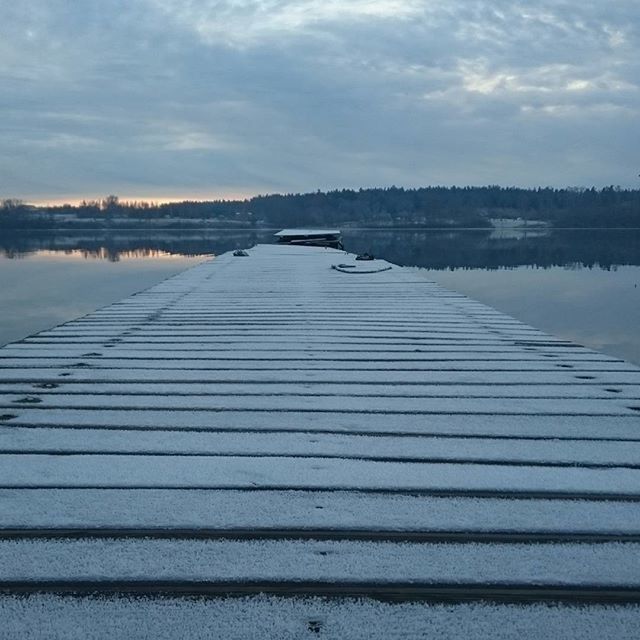 water, sky, lake, pier, cloud - sky, tranquil scene, tranquility, reflection, wood - material, jetty, nature, cloud, scenics, beauty in nature, cloudy, river, transportation, nautical vessel, outdoors, no people