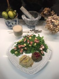 High angle view of fruits in plate on table