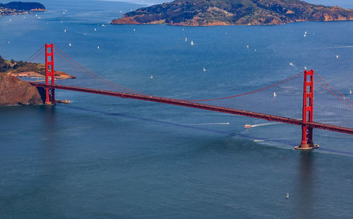 View of suspension bridge over sea