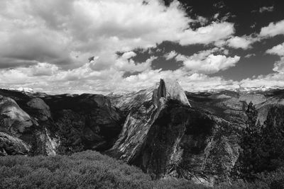 Panoramic shot of rocks on land against sky