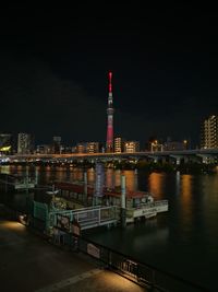 Illuminated buildings in city at night