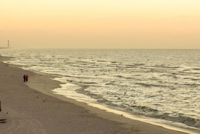 Scenic view of beach during sunset