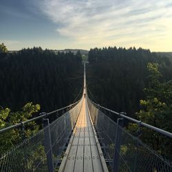 High angle view of footbridge against sky