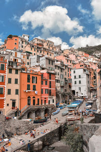 High angle view of riomaggiore amidst buildings in city