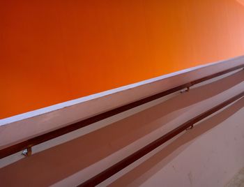 Low angle view of orange wall