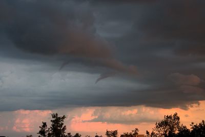 Low angle view of dramatic sky during sunset