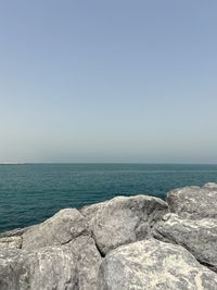 Scenic view of sea against clear sky