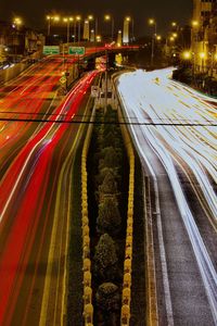 High angle view of light trails on street at night