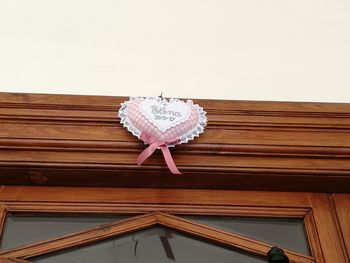 Low angle view of umbrella on wood