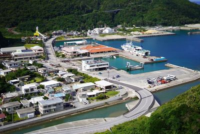 High angle view of city by sea