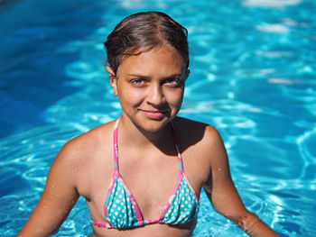 Portrait of woman swimming in pool