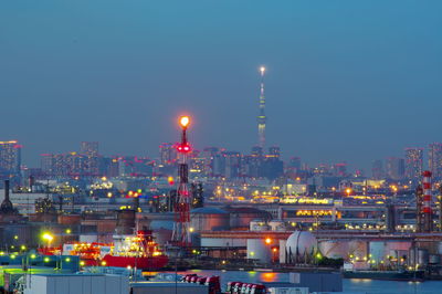 Illuminated buildings in city at night