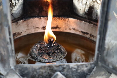 Close-up of burning candle