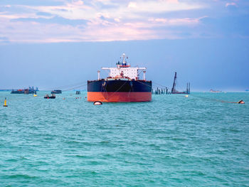 Ship in sea against sky