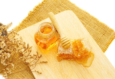 High angle view of glass jar on table