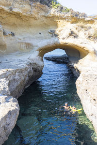 High angle view of rock formation in water